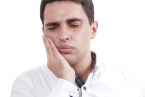 Young Man Suffering From Toothache